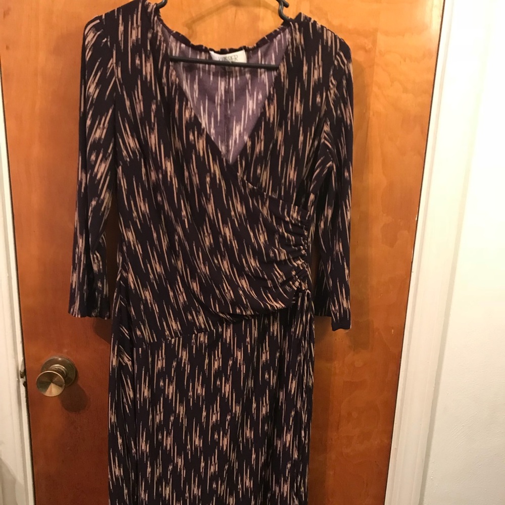 Long sleeve purple and beige dress.